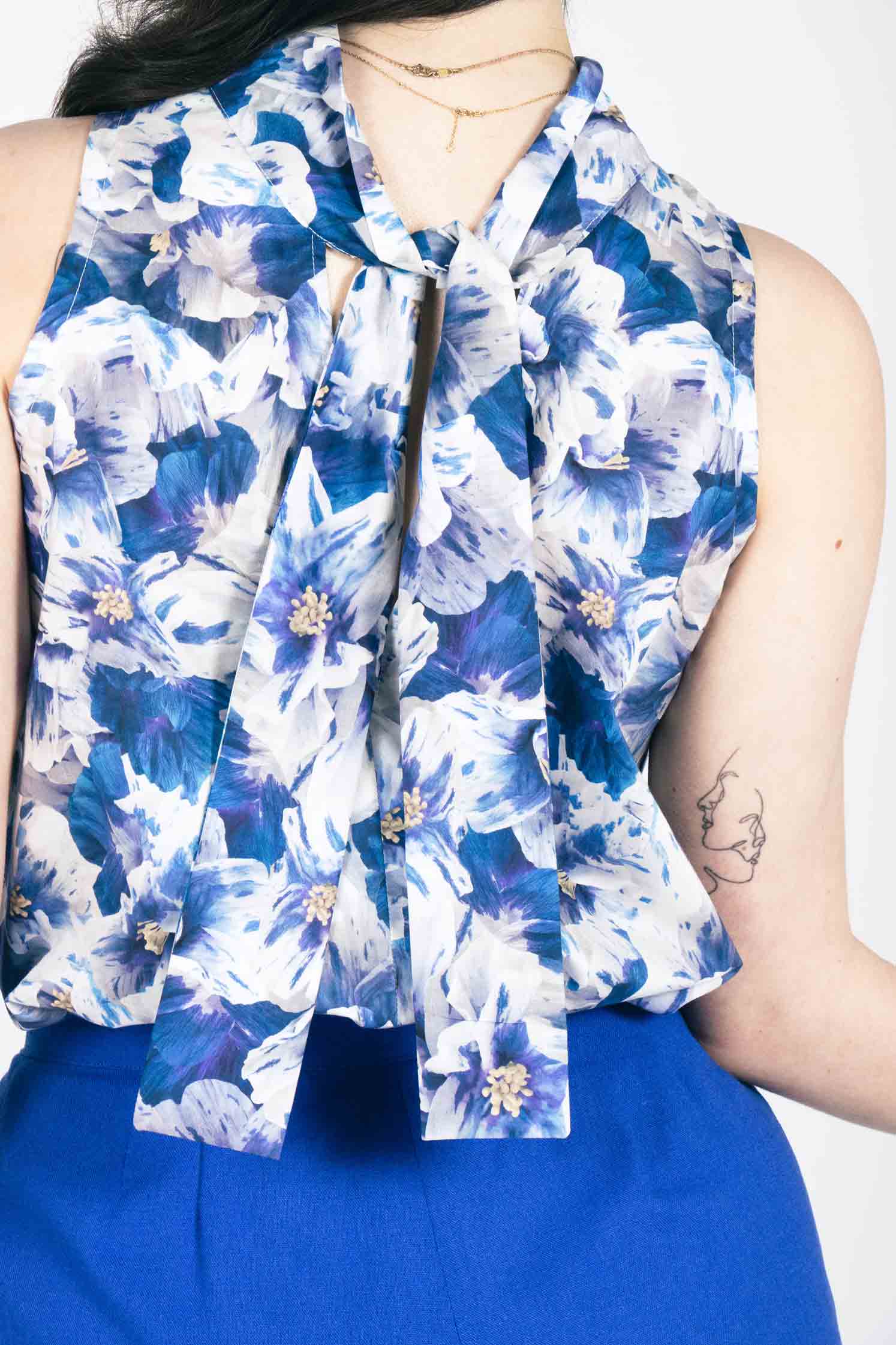 reversible floral top with high neck and pussy cat bow neck tie.
