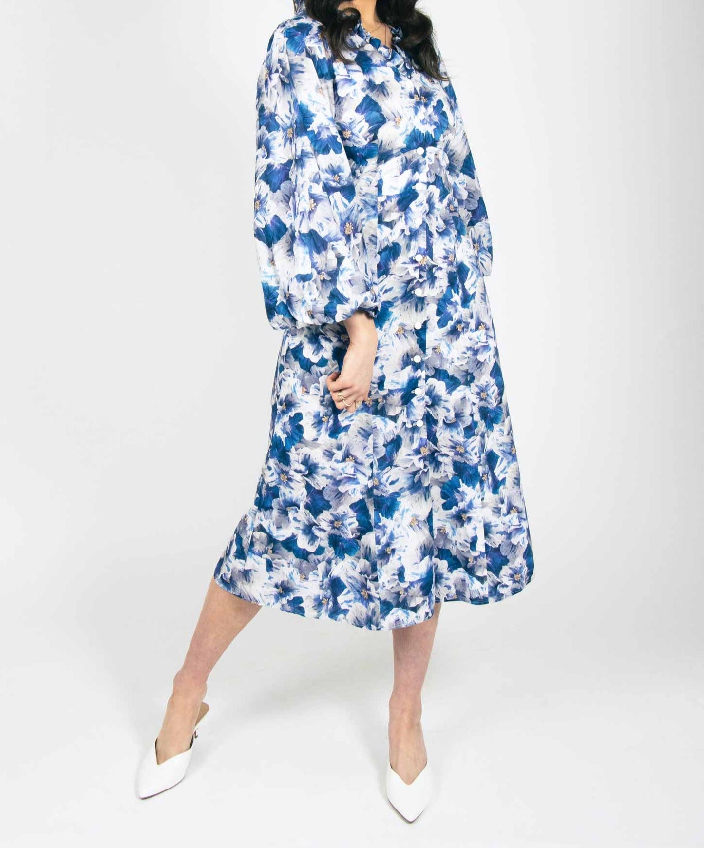 blue and white floral mid length dress with puff sleeves and button up front