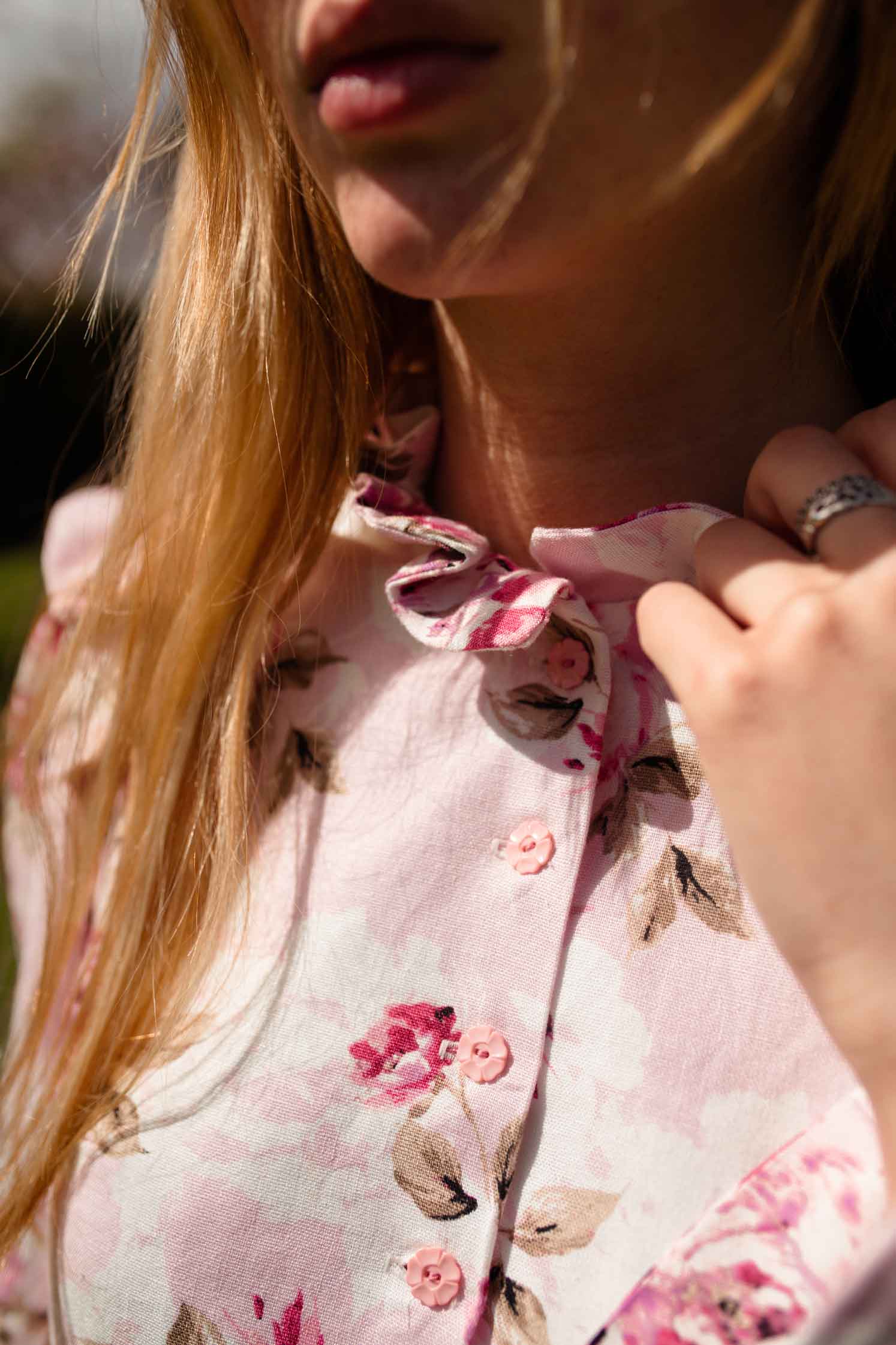 up close ruffle details and flower buttons. 