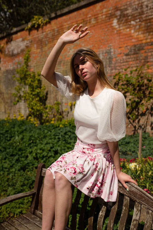 pink mini skirt with ruffle hem and white blouse. irish made ladies fashion